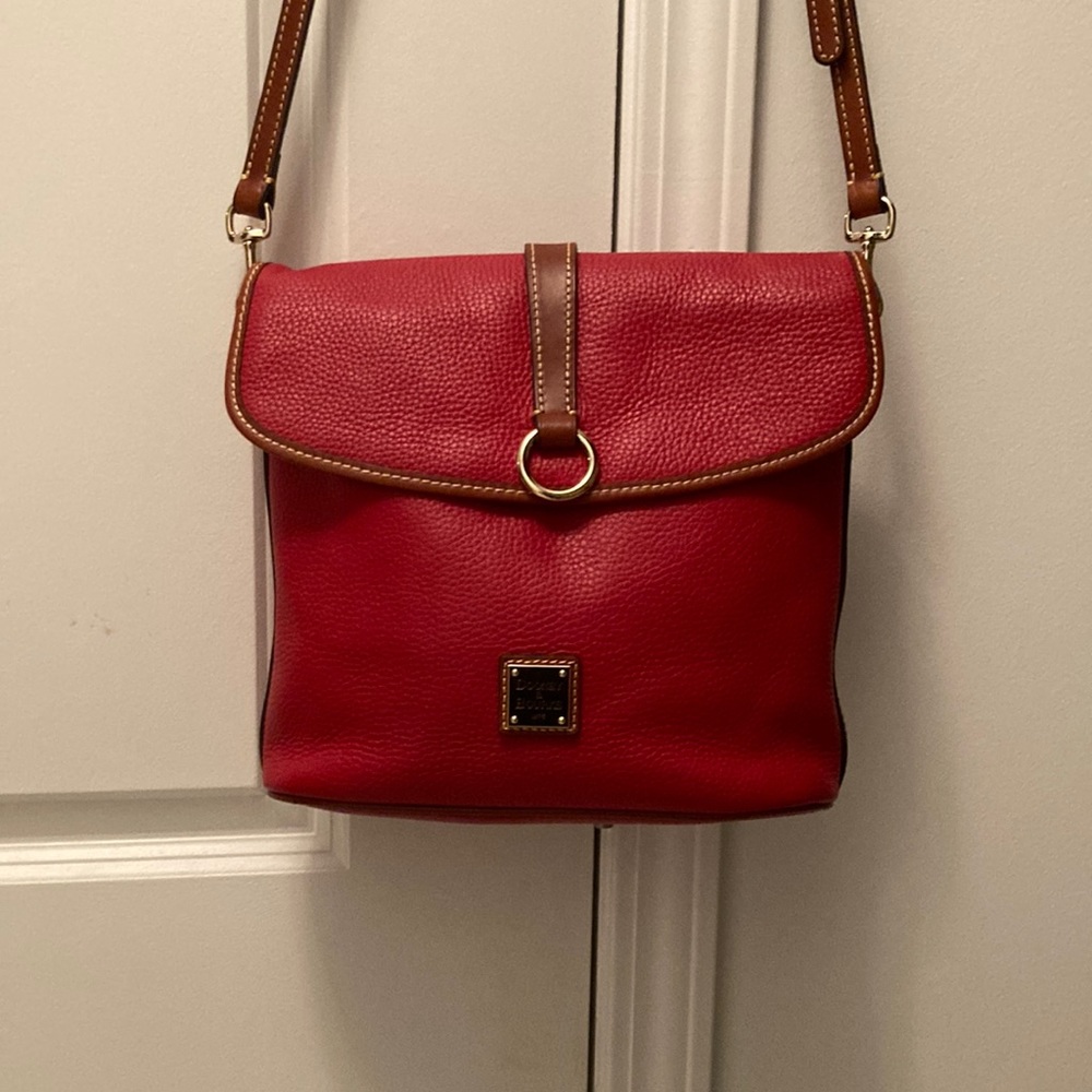 Dooney and Bourke Red leather with brown trim and strap Bag